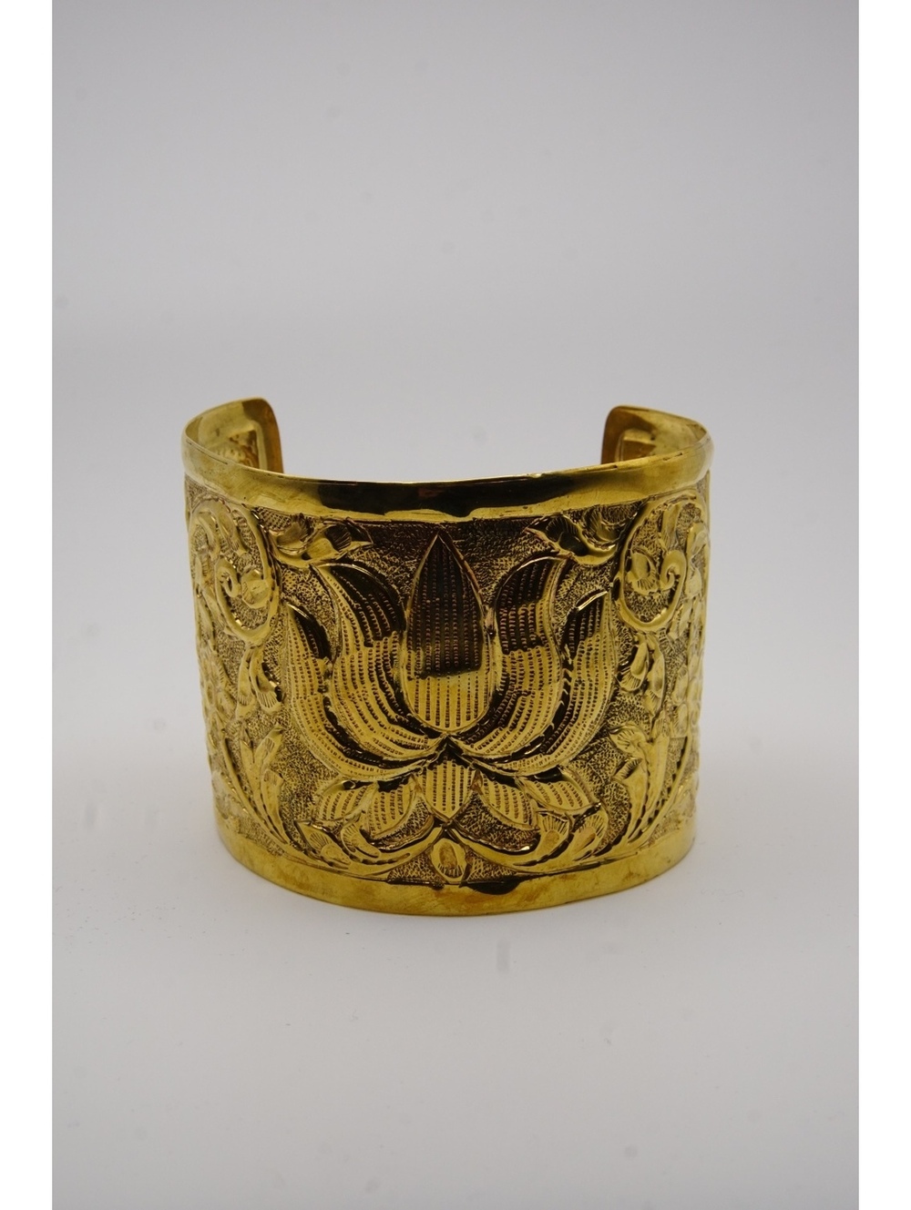 Gold tone engraved cuff bracelet